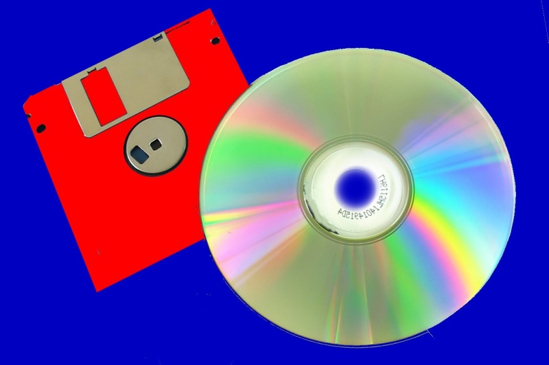 A red Floppy disk and a CD.