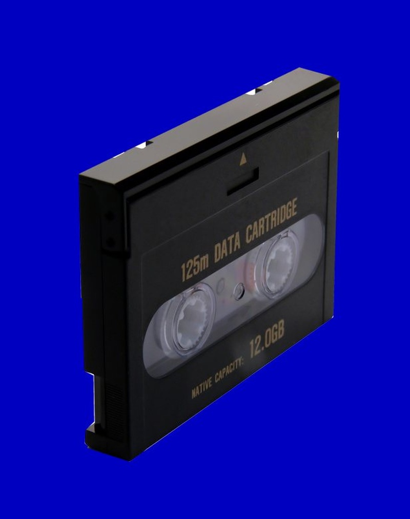 A DAT tape shown at an angle to the camera. The original computer system or software was unknown but it held some vital CAD drawings that needed to be downloaded to USB.