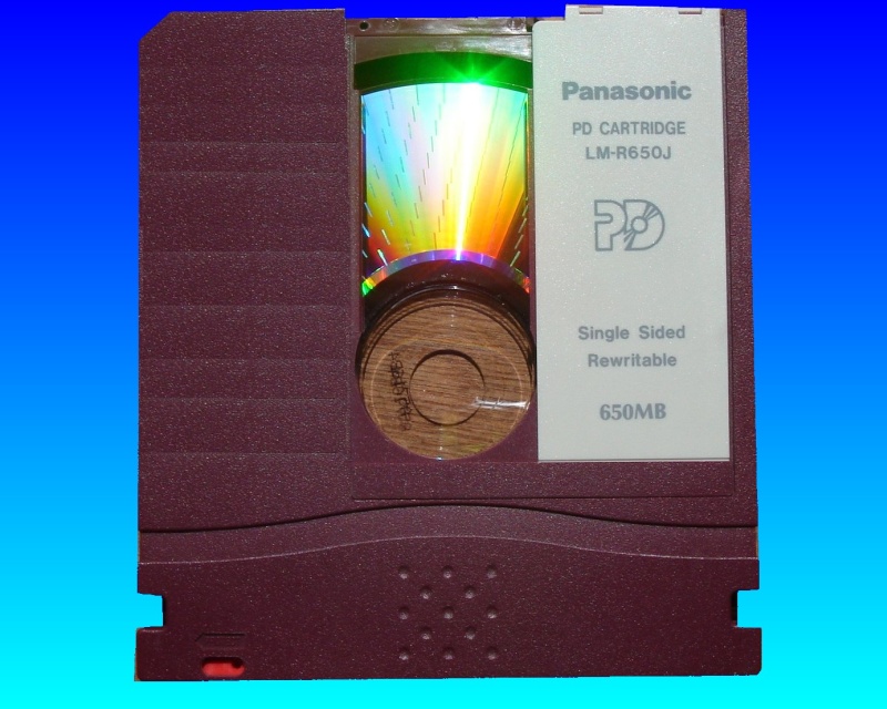 A PD disk cartridge by Panasonic which stored 650mb of data which will shortly undergo transfer to CD. 