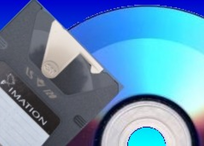 A Superdisk shown together with a CD. Superdisk conversions are now becoming more popular when saved to USB flash memory.