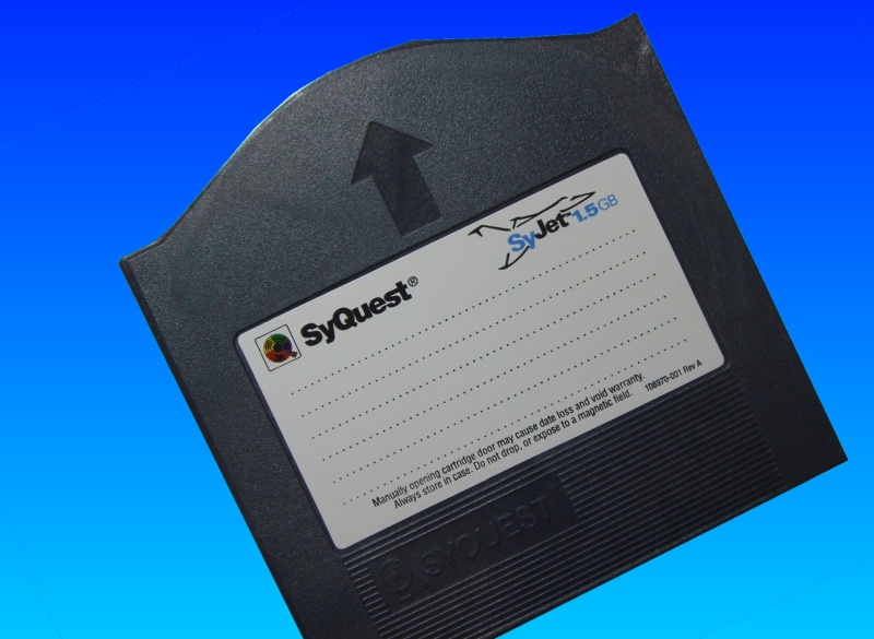 A Syjet disk made by Syquest awaiting to have it's data read and copied to CD. These days most people have it read to USB memory stick or download. 