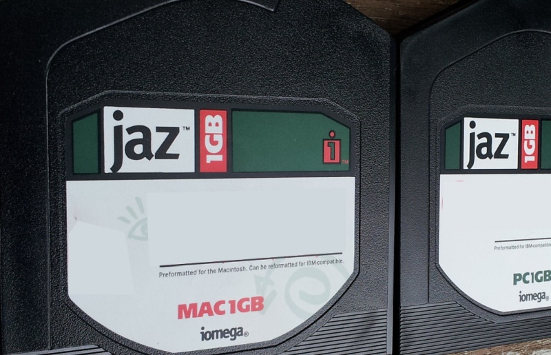 A close up of the labels from an Iomega Mac 1GB. The disk is preformatted for the Macintosh computer. Also seen is a PC 1GB disk to the right hand side of the image.