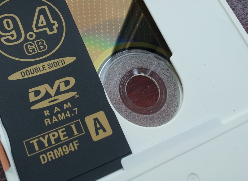 A DVD-RAM made by Imation - 5.2gb Type 1 in a cartridge case. The Recording surface is shown under the outer slide cover. The DVD-RAM was used to store files.