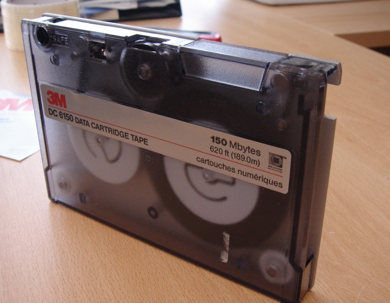 A single tape data cartridge by 3M. This particular model isa DC 6150 150Mbytes labelled cartouche numeriques 620ft long or 189.0m. It was made using windows backup software.