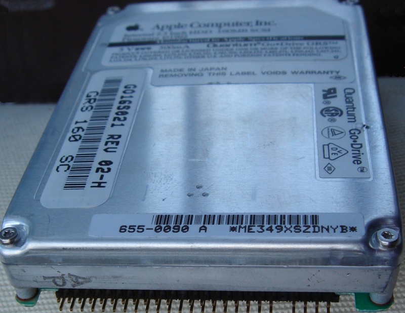 A SCSI Quantum Go-Drive 2.5inch disk taken from an Apple Mac Power-Book laptop. The drive photo was taken showing the 40 pin connector facing the camera. These drives were also used in external scsi caddy cases usually with a 25 pin interface. 