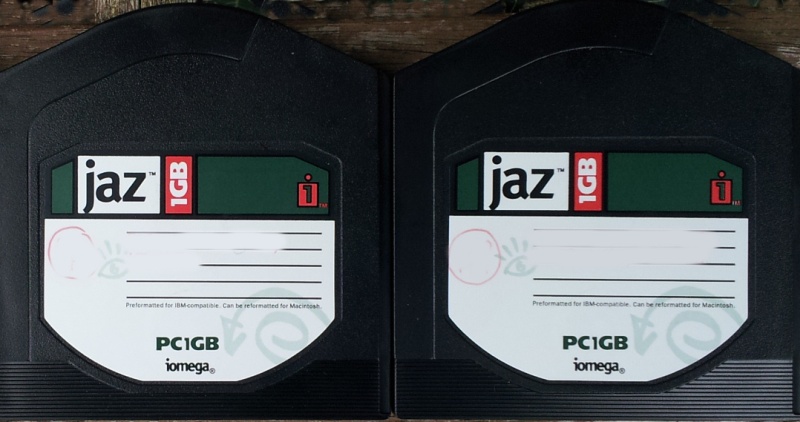 A pair of Jaz disks (1GB) that were used in an old Windows PC. The disks stored Paperport and Quicken files. The disks are black in colour and made by Iomega with white labels.